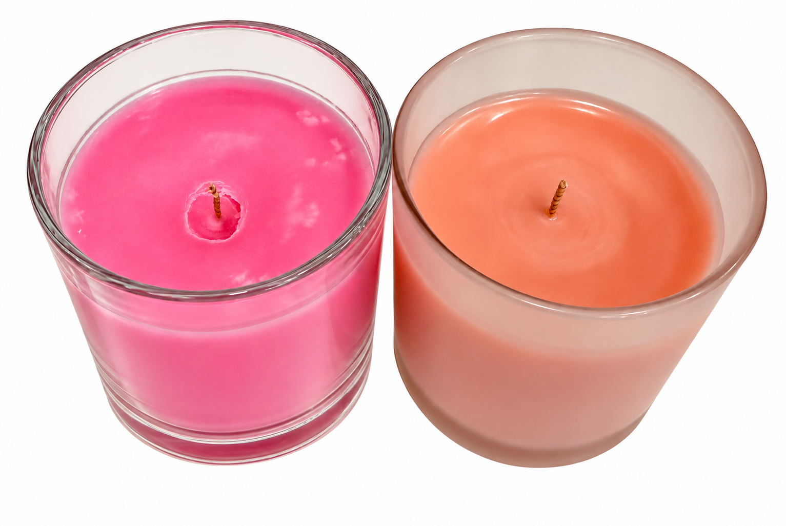Pink and peach candles showing different wax surface finishes